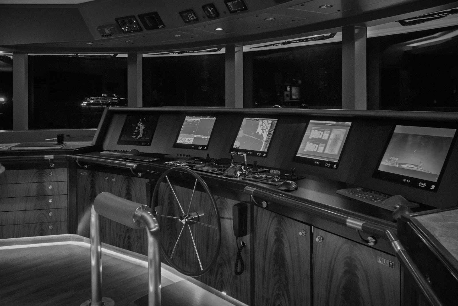 The bridge of M/Y Avalon, instruments lit